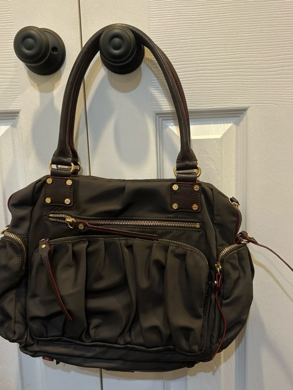 MZ Wallace Shoulder Bag with Gold Hardware and red detail